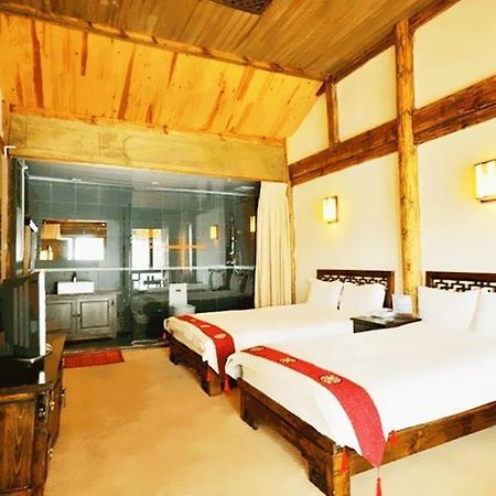 ليجيانغ Golden Waterfront Inn المظهر الخارجي الصورة