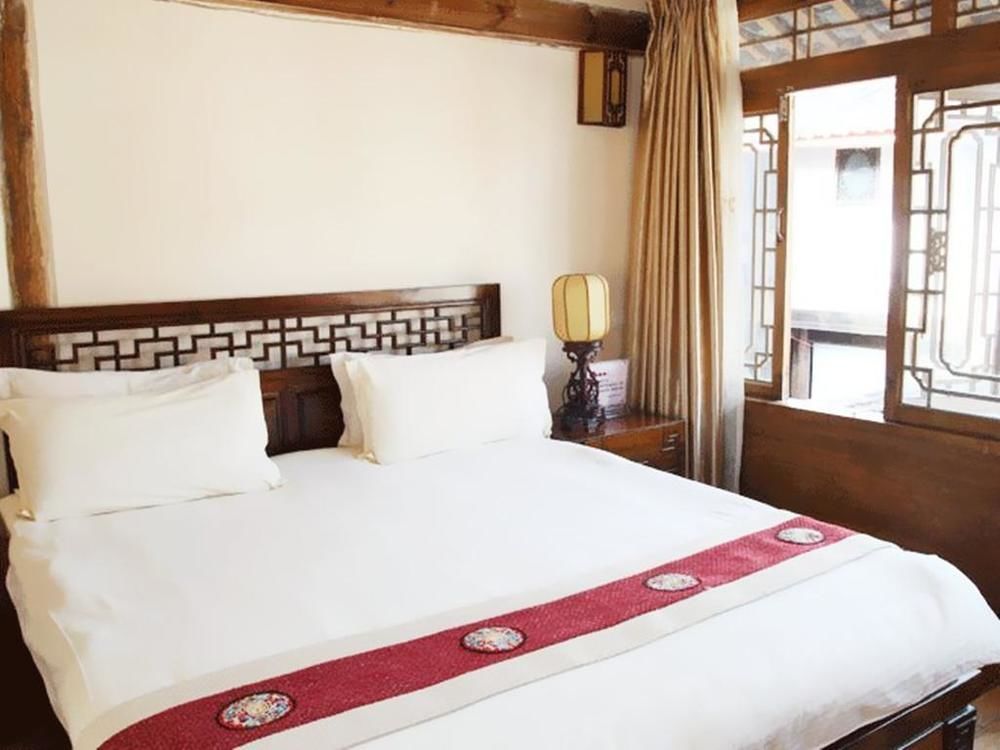 ليجيانغ Golden Waterfront Inn المظهر الخارجي الصورة